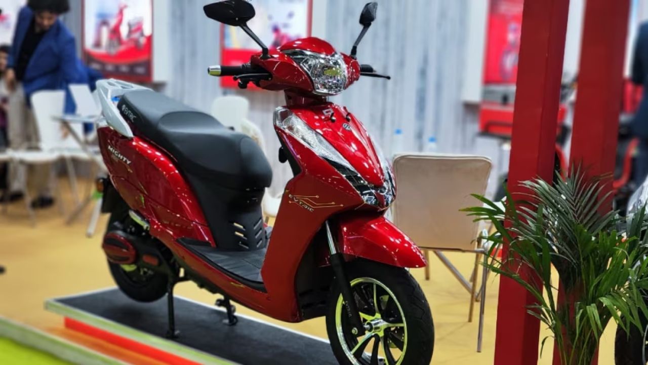 here is a image of red colour Evtric Ride Electric Scooter which is palaced in ectric scooter showroom