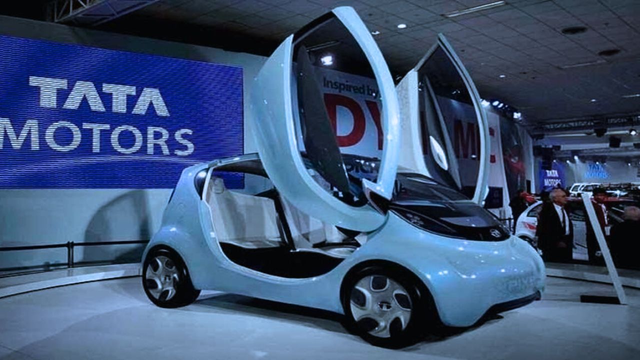 A image of Tata Nano EV With open gate which is palaced in Tata car event